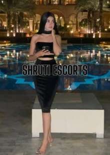 Stunning Best Call Girls In Dehradun posing by the poolside at a 5-star hotel