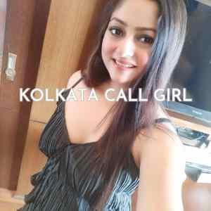 Elite Kolkata escort models posing near a luxury sports car in South Delhi